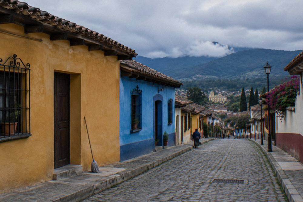 A colonial street with colorful facades in a highland town