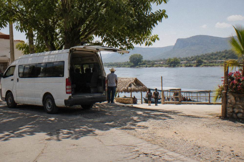 Shared van parked on a street corner in a Chiapas town